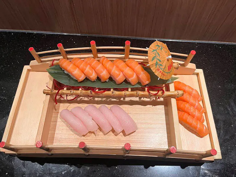 Salmon & white fish nigiri served in a boat platter at Sushi Kami, a Japanese Restaurant in Lakewood Ranch